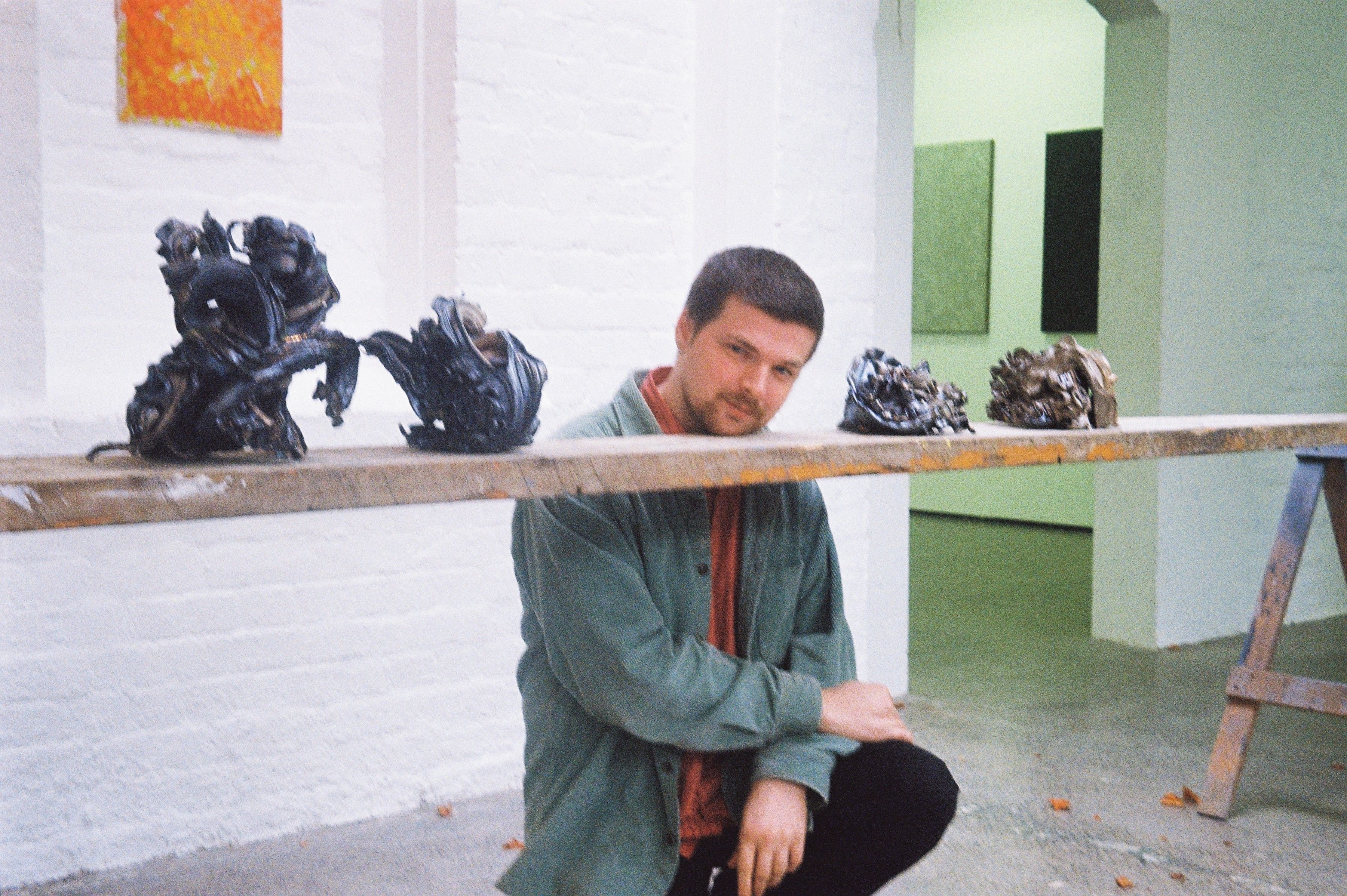 Peter Derksen pic with work.JPG